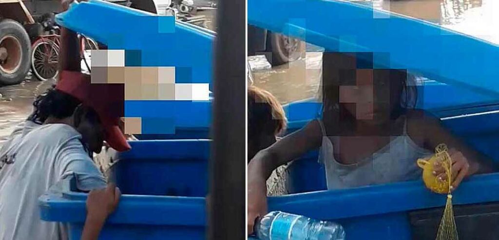 Em meio à enchente em Feijó, família busca alimento em lata de lixo